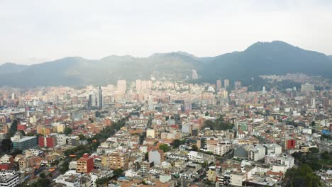 Aerial-view-of-Bogota,-Colombia,-with-mountains-in-background