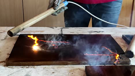 Fractal-wood-burning-with-high-voltage-electricity-in-woodworking-shop