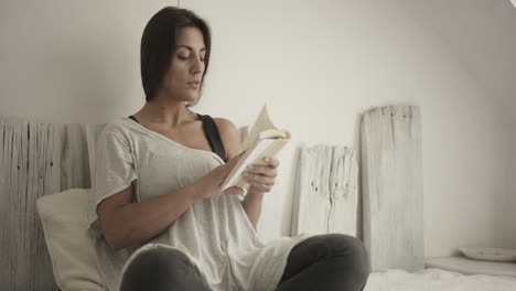 Young-woman-reads-a-book