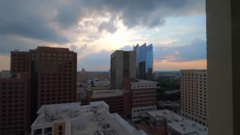 Timelapse-showing-downtown-San-Antonio,-Texas-with-the-sunset-as-background
