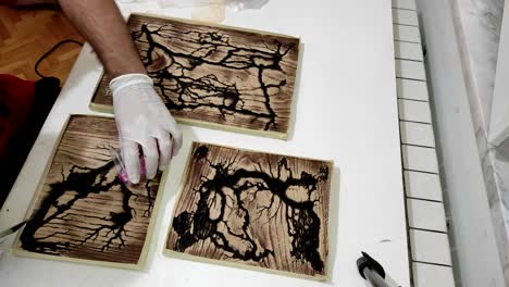 Pouring-Epoxy-Resin-in-the-holes-in-oak-wood