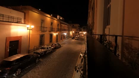 Timelapse-of-a-street-in-Oaxaca,-Mexico-at-night