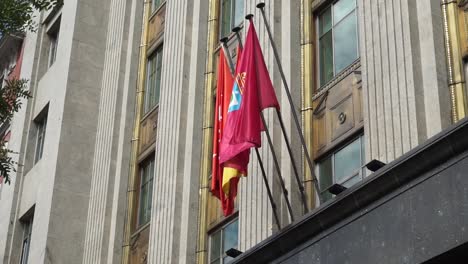 Flags-of-Madrid-and-Spain-flying-outside-Ayuntamiento-de-Madrid-building