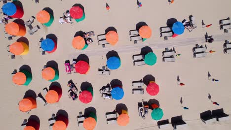 Top-View-Of-Beach-Umbrellas-At-The-Resort-In-Deauville,-Lower-Normandy,-Northern-France