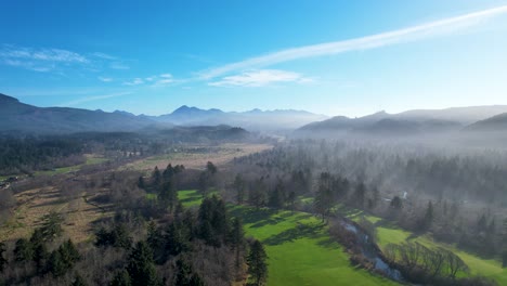4K-aerial-drone-shot-floating-over-golf-course-at-Seaside,-Oregon-beach-on-a-hazy-afternoon