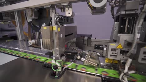 Closeup-Of-Modern-Automated-Machine-Printing-Cards-In-A-Card-Manufacturing-Business