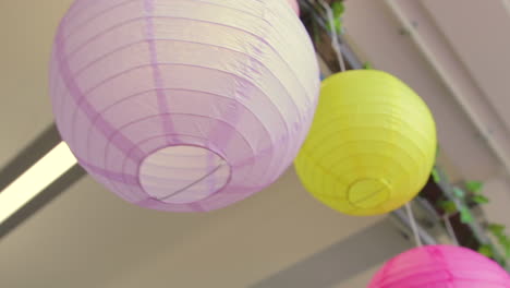 bright-colourful-paper-lanterns-hanging-from-ceiling