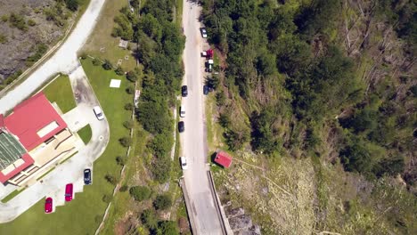 Closeup-Aerial-Drone-Shot-Following-a-Road-through-the-Mountains