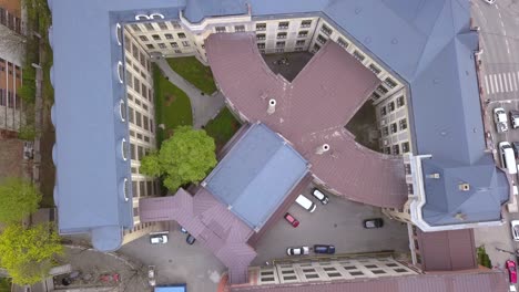 Aerial-Drone-Shot-Pulling-Straight-Up-Revealing-a-Mid-Century-Building