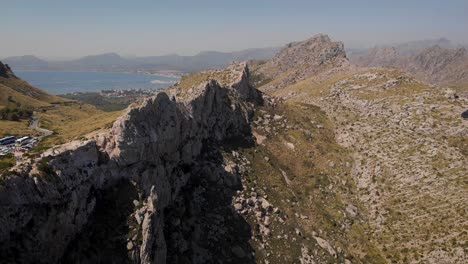 AERIAL:-Mountains-at-Cape-Formentor-with-view-to-Alcudia-bay-on-Mallorca