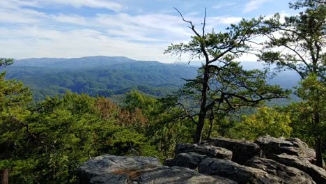 A-view-of-the-Great-Smoky-Mountains-National-Park-with-the-wind-blowing-filmed-on-a-rock-cliff-in-the-Foothills-Parkway-located-in-the-Smoky-Mountains