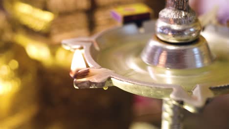 Oil-Lamp-in-the-Temple,-South-Indian,-Slow-Motion-Close-up-Shot