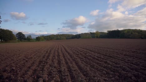 Panning-shot-of-ploughed-agricultural-field