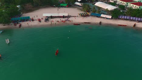 Aerial-boat-teams-in-rowing-competitions-in-bay-of-tropical-island