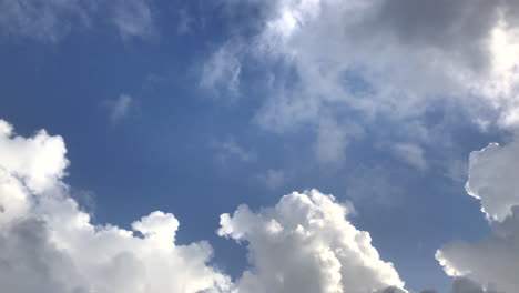 Fast-moving-Cumulus-puffy-clouds-shot-from-below