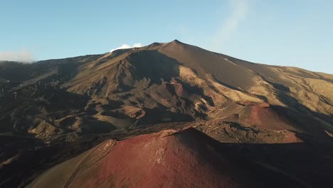 Drone-flight-over-a-large-crater-of-the-Etna-volcano,-Sicily,-Italy