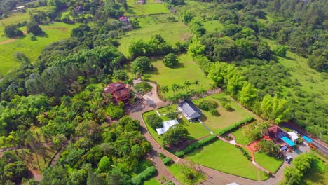 Luxurious-residential-houses-surrounded-by-lush-greenery-at-Jarabacoa,-Dominican-Republic