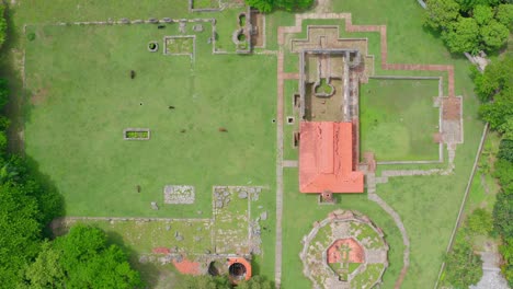 Aerial-top-down-shot-showing-old-ruin-in-Dominican-Republic-during-summer