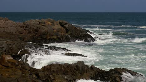Waves-break-over-the-rocky-shoreline-on-the-Atlantic-coast