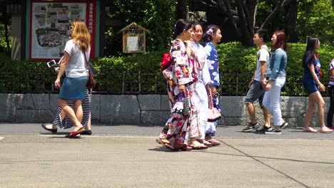 Womans-wearing-traditional-japanese-kimono-among-Sensoji-Temple-in-Asakusa-Tokyo,-Japan