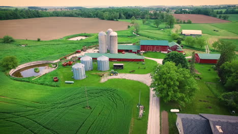 Beautiful-farm-with-a-large-red-barn-and-grain-silo