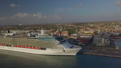 Aerial-view-of-the-bow-on-big-cruise-ship-in-dock-with-a-pan-movement-4K
