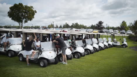 Large-line-up-of-golf-carts-before-a-tournament