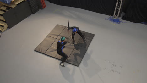 High-wide-angle-of-actors-in-MoCap-suits-doing-a-choreographed-fight