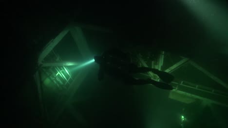 Backmount-tech-diver-explores-flooded-nuclear-missile-silo