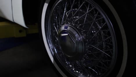 Close-Up-of-a-Classic-Jaguar-Car-Wheel-on-a-Lift
