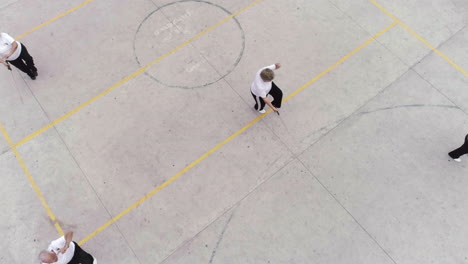 Aerial-shot-of-elderly-people-Practicing-Tai-Chi