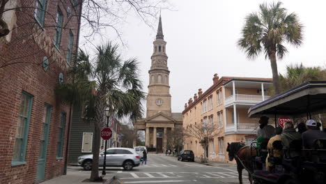 Exterior-of-Saint-Philips-Church-in-Charleston-with-horse-drawn-carriage-in-foreground