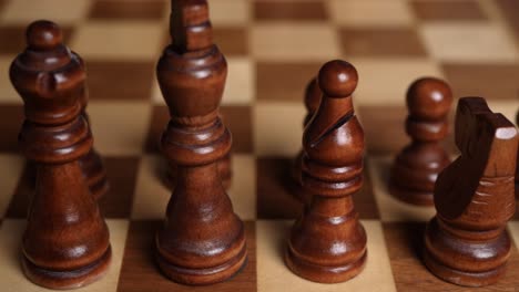 Sliding-over-the-brown-figures-on-a-chess-board