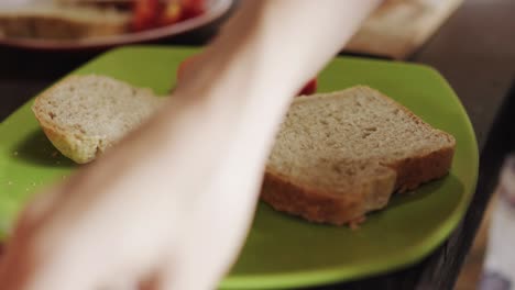 Making-sandwiches-on-casual-kitchen