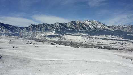 Aerial-view-of-Boulder-Colorado-Mountains-covered-in-snow