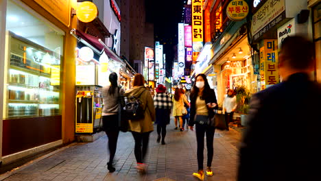 Seoul-South-Korea---Circa-Time-lapse-of-people-walking-through-Myeongdong-Market-in-Seoul,-South-Korea