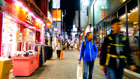 Seoul-South-Korea---Circa-Time-lapse-of-people-walking-through-the-shops-at-Myeongdong-Market-in-Seoul,-South-Korea