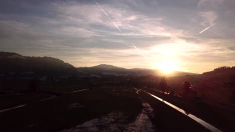 Beautiful-moody-winter-mountain-scenery-in-Switzerland-while-sunset