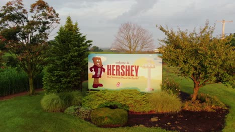 Slow-aerial-dolly-shot,-Welcome-to-Hershey,-Sweetest-Place-on-Earth-billboard
