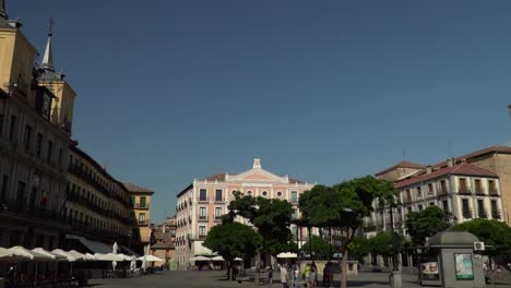 Right-moving-dolly-around-Segovia-Main-square-on-sunny-day-SLOW-MOTION
