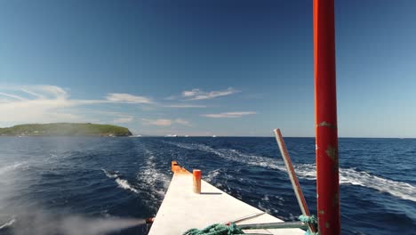 Rear-passenger-view-on-travel-boat-leaving-island
