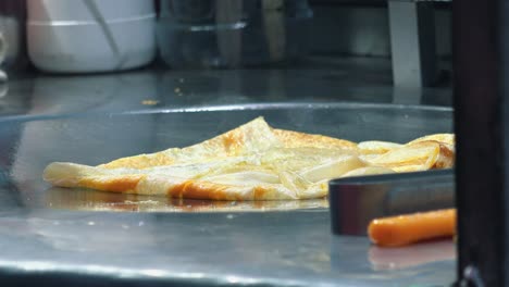 Close-Shot-of-Making-Crepes-at-the-Night-Market-for-Street-Food