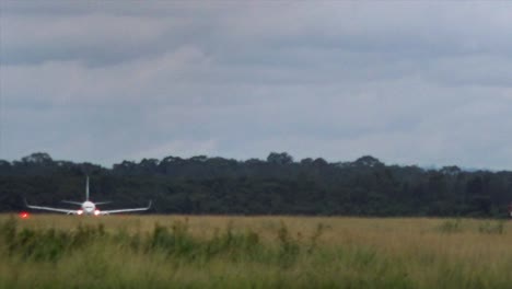 Wide-Shot-of-a-Plane-Taking-Off-in-Slow-Motion