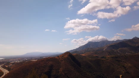 moving-time-lapse-in-marbella-showing-clouds-moving-over-la-concha-mountain,-sea-view