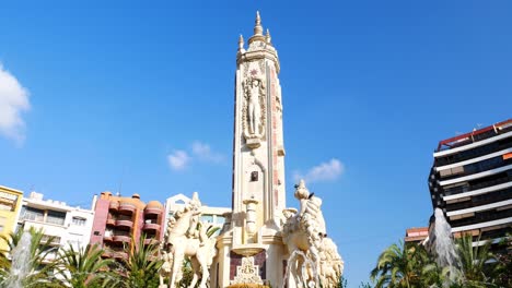 Tilt-up-to-the-fountain-of-Luceros-square-in-Alicante-on-a-summer-day
