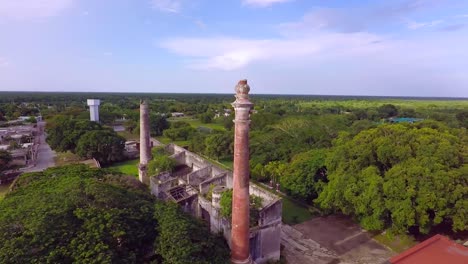 Aerial-view-with-drone-of-the-San-Pedro-Chimay-farm-in-ruins,-which-had-2-chimneys-in-Yucatan