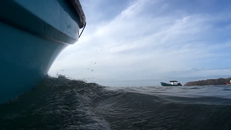 View-from-the-side-of-a-boat-at-water-level-on-a-sunny-day-1-slow-motion