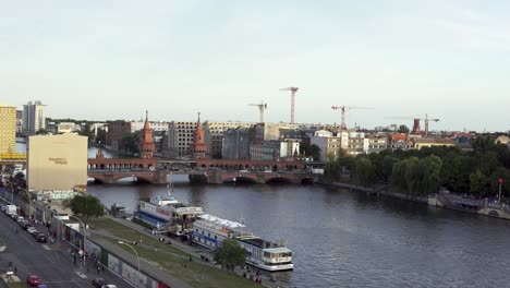 City-view-of-Oberbaum-bridge-in-Berlin-with-river-Spree-and-East-side-Gallery