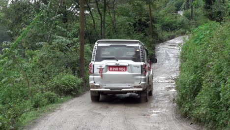 Kathmandu,-Nepal---September-27,-2019:-Traffic-and-vehicles-on-a-dangerous,-muddy-mountain-road-in-the-foothills-of-Kathmandu,-Nepal-on-September-27,-2019