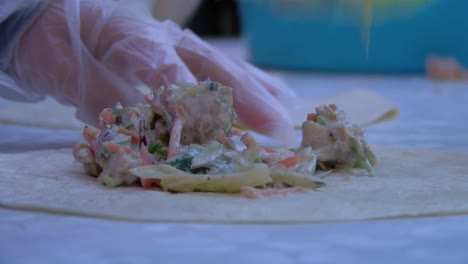 Young-people-make-tortillas-from-salads-and-meat